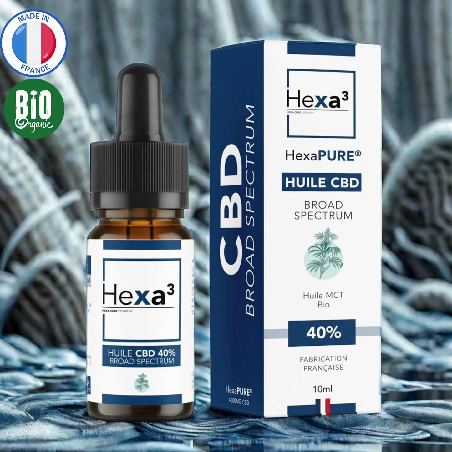 Huile CBD 40% Broad Spectrum : flacon pipette ambré et son packaging blanc et bleu marine. Made in France, huile MCT bio, 10ml.